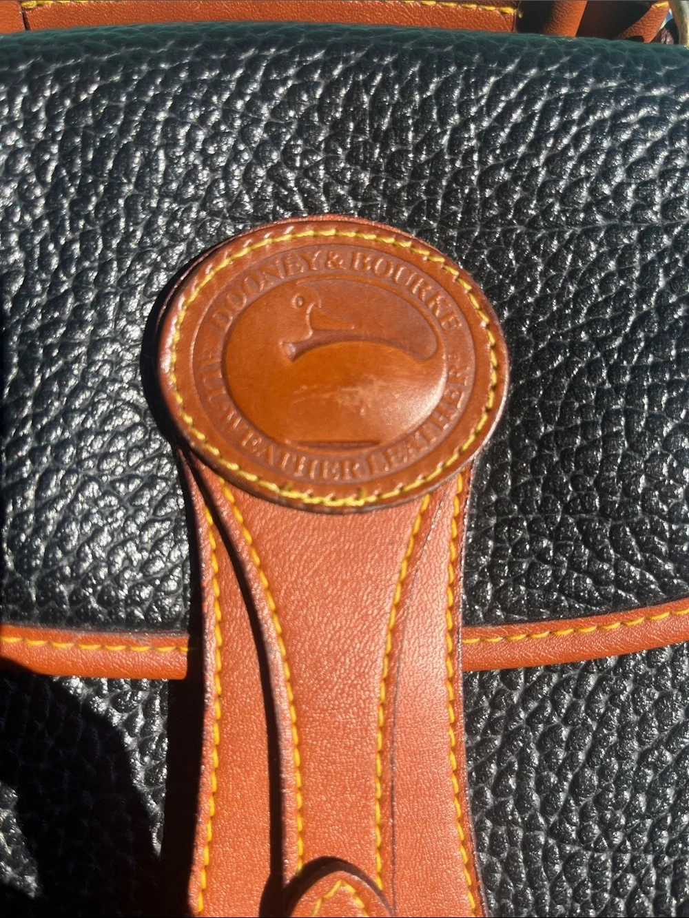 Dooney & Bourke Black Pebbled Leather Messenger with Tan Trim and Handle